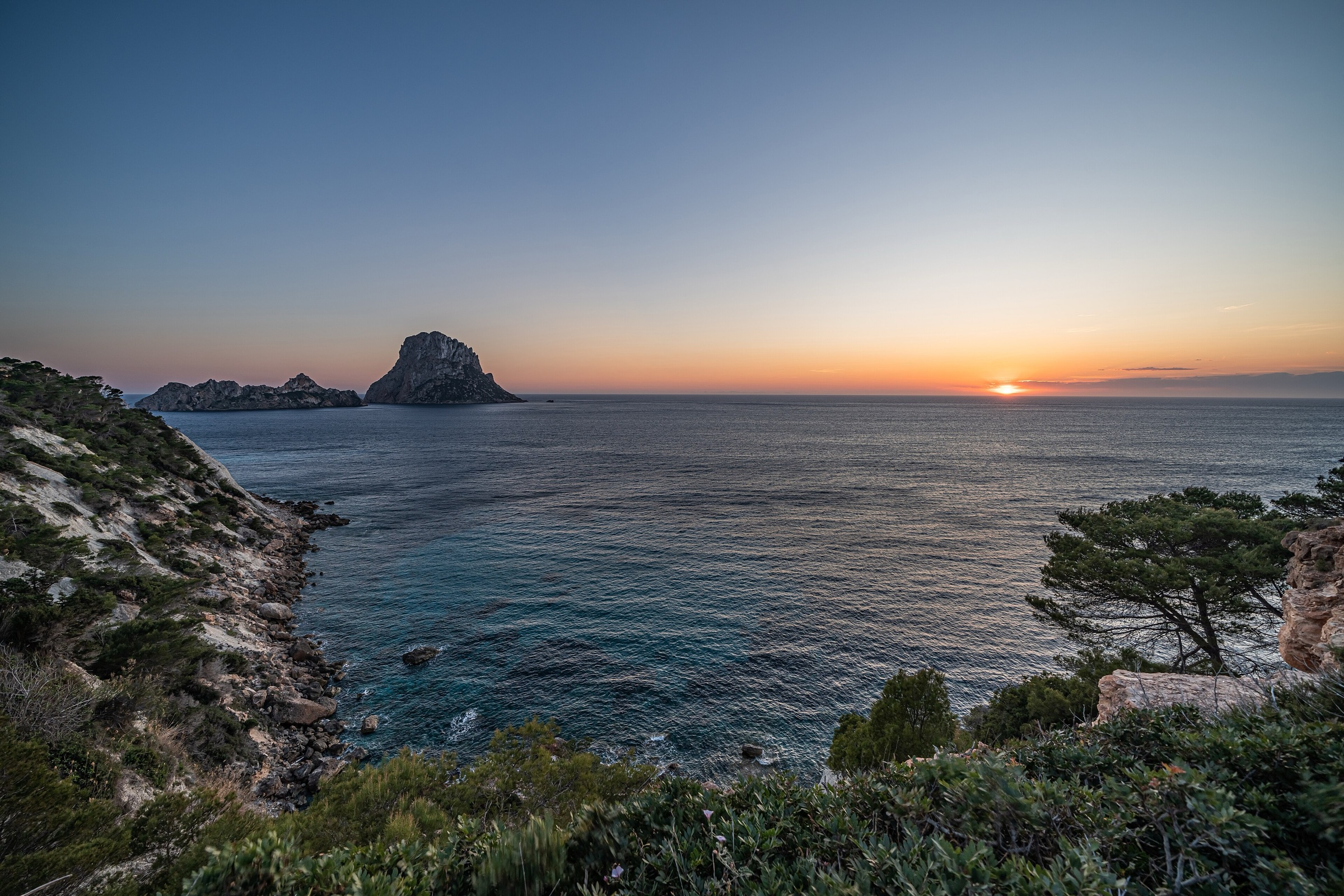 Es Vedrà rock formation off the coast of Ibiza at sunset